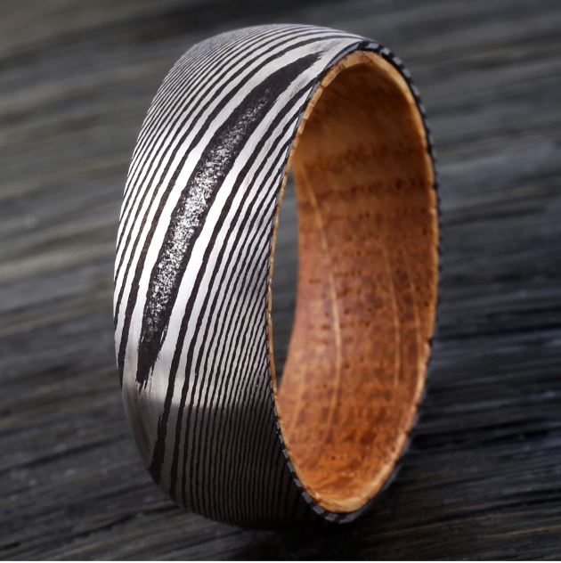 Wood Grain Damascus Steel and Whiskey Barrel Ring